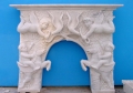 white decorative marble fireplace mantel