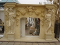 Beige marble fireplace mantel surround