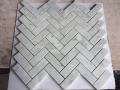 Herringbone shape carrara marble mosaic