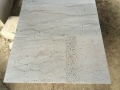honed basalt tile with lines and holes
