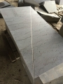 honed basalt tile with lines and holes