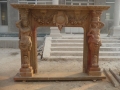 Yellow marble decorative fireplace mantel with carving